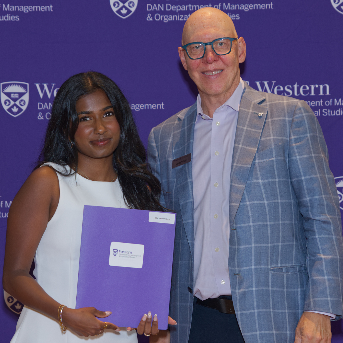Mr. Aubrey Dan with Karen Oommen who won the Dancap Private Equity Graduating Student Award in Management & Organizational Studies